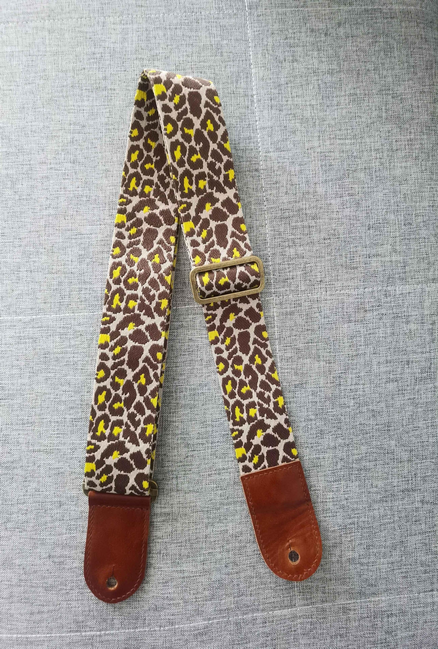 Polyester Guitar Strap with leopard print.